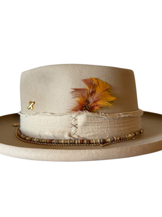 detail-of-the-gold-cross-stitch-makers-mark-on-the-crown-of-the-vesper-ivory-felt-fedora