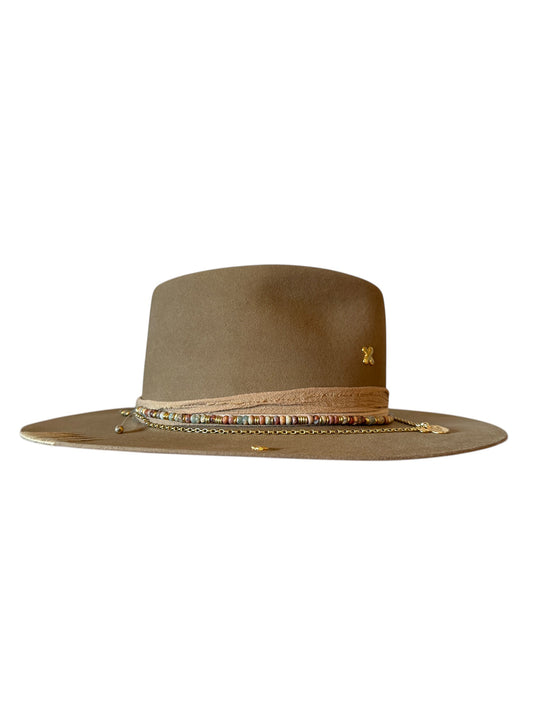 mesa-camel-felt-fedora-side-profile-showing-the-gold-x-makers-mark-on-the-crown-and-the-layered-hat-band-of-jasper-gold-chain-and-frayed-silk