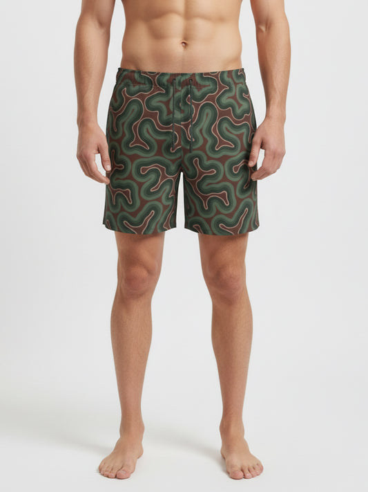 swim-trunk-sparrow-by-copala-beach-drawstring-swim-short-in-brown-and-green-abstract-wave-print-on-model-front-view